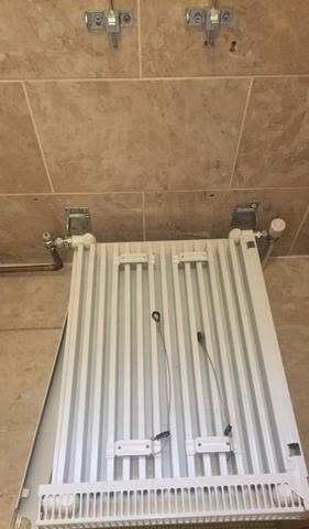 removing a radiator from a tiled wall - removing radiator from bathroom